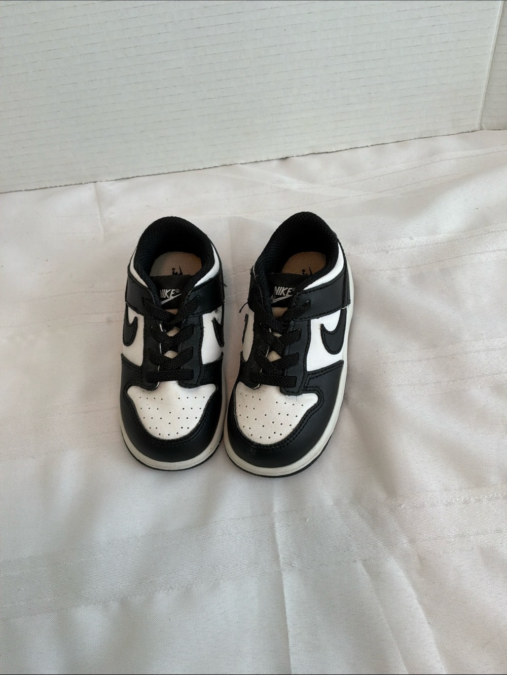 Nike Kids Black and White slip on sneakers size 8c